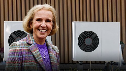 A photo of Susan Murray next to heat pumps with the following text below. Challenging heat pump myths with Susan Murray MP. 5pm 16th Jan. Sign Up.