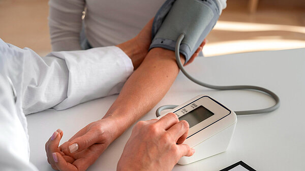Person taking blood pressure