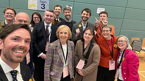 Adam Harley with Susan Murray and a happy group of Lib Dem activists